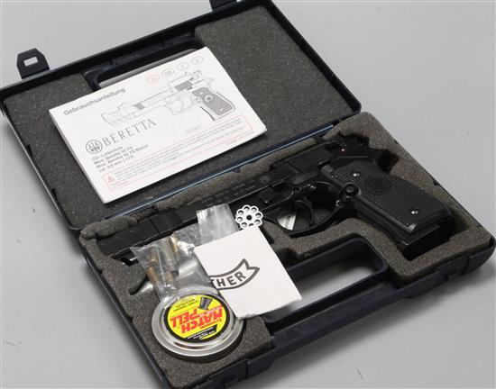 A Beretta Mod. 92 FS .177 air pistol, cased, sundry related items and a folder of The Great British Regiments badges